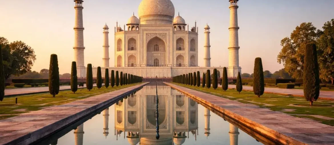 Taj Mahal in Agra, India photographed at sunrise showing white marble Mughal architecture