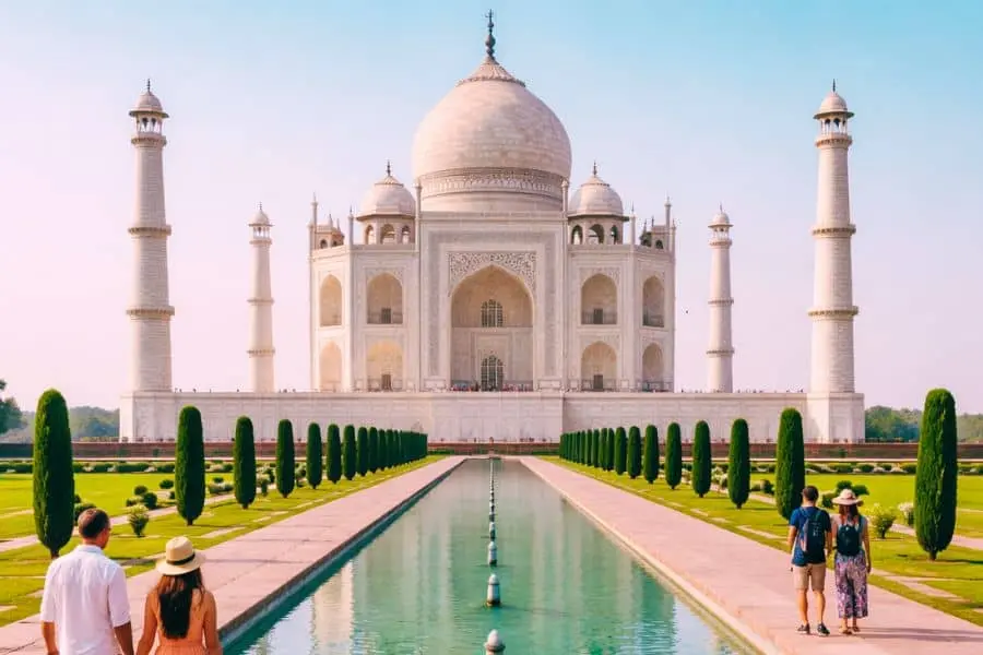 tourists visiting Taj Mahal historical monument India 