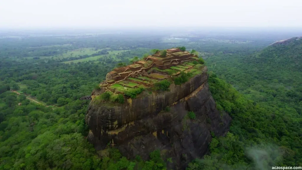 Aerial view of the ancient Sigiriya Rock Fortress surrounded by forest in Sri Lanka