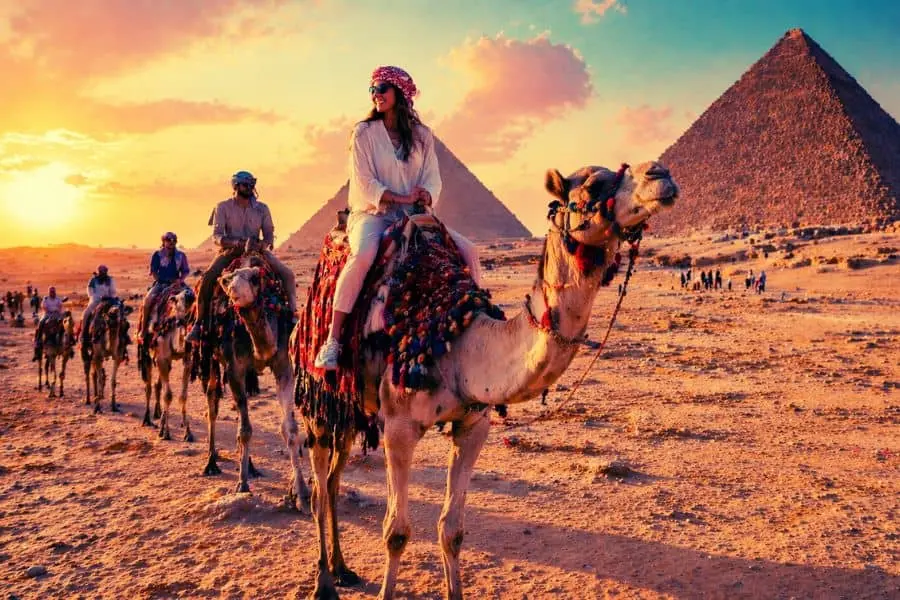 travel guide pyramids of Egypt secrets camel ride experience desert tourism 